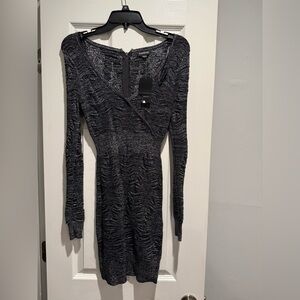 Bebe long sleeve new year’s eve mini dress.